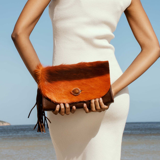 The Malaika Springbok Clutch Bag In Sunset