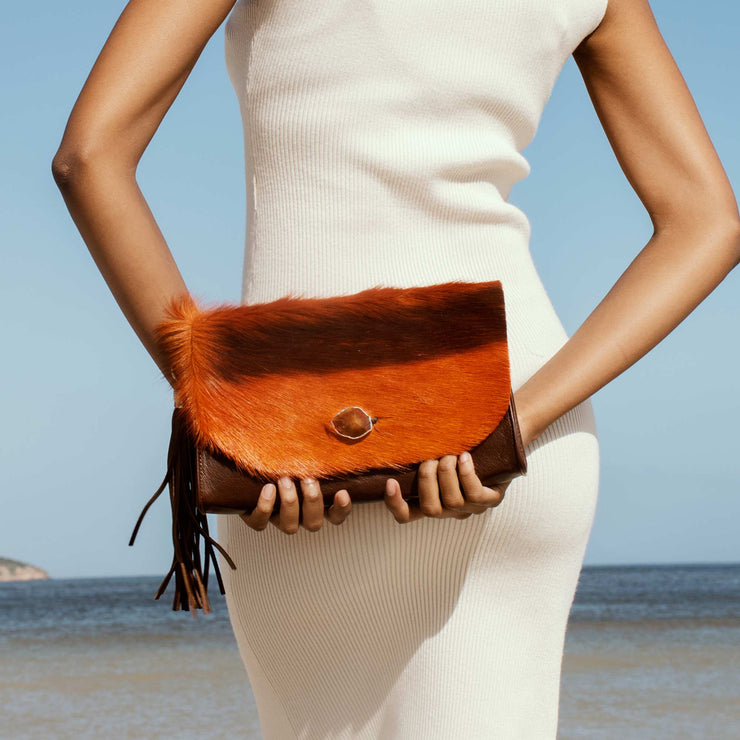 The Malaika Springbok Clutch Bag In Sunset