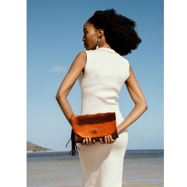 The Malaika Springbok Clutch Bag In Sunset