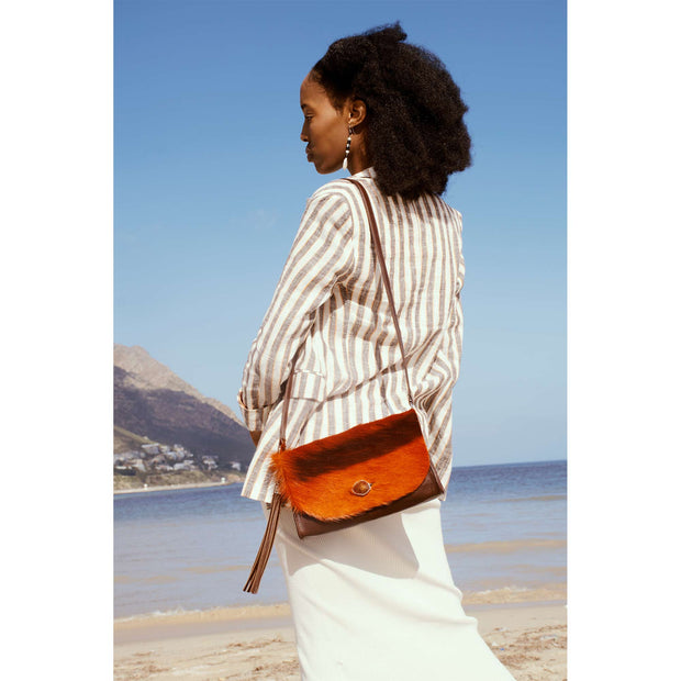 The Malaika Springbok Clutch Bag In Sunset